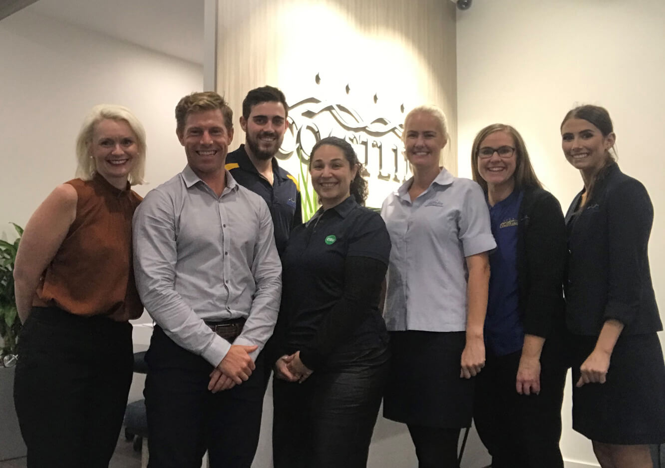 Christine Bekoe pictured with some of the staff at Coastline Credit Union, Port Macquarie