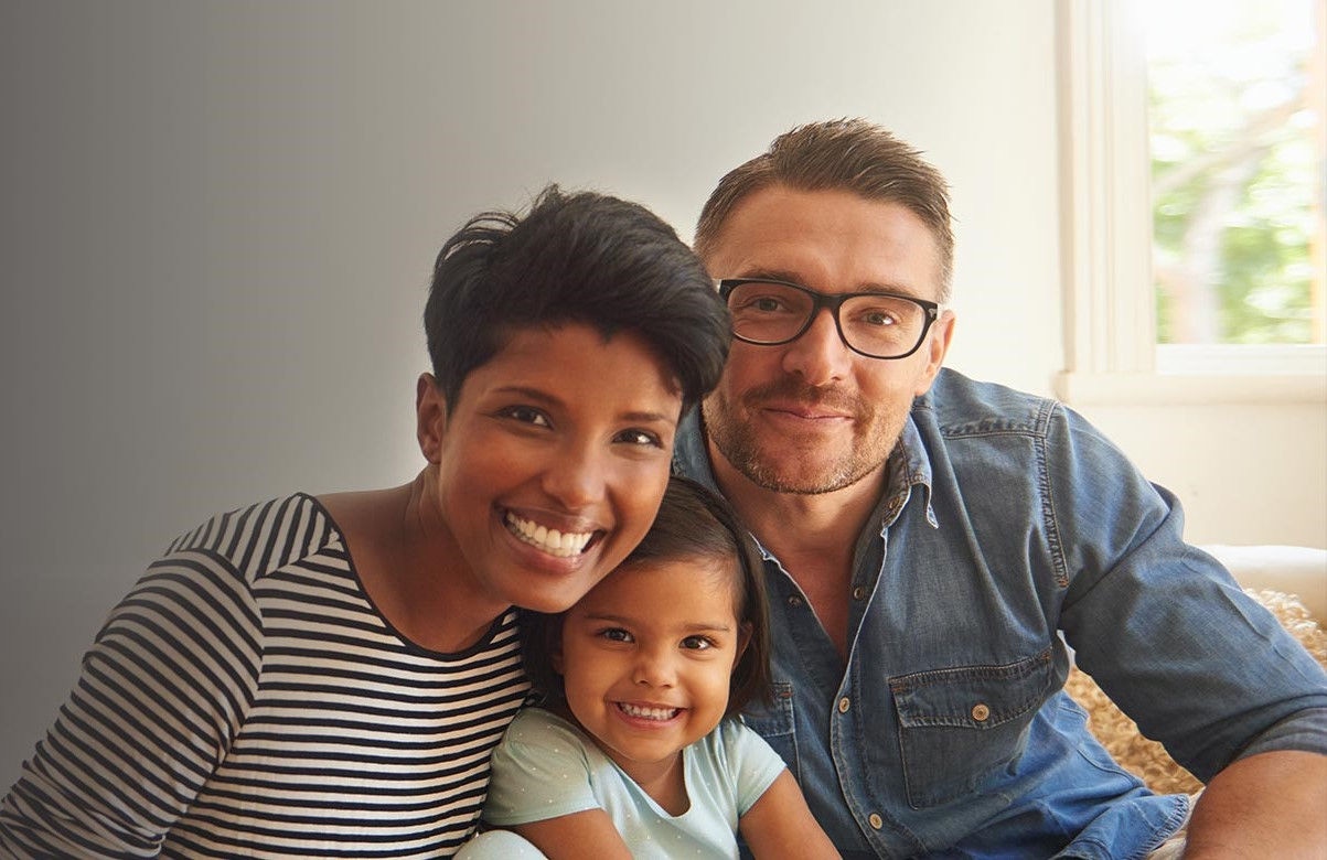 Small family of three on the couch