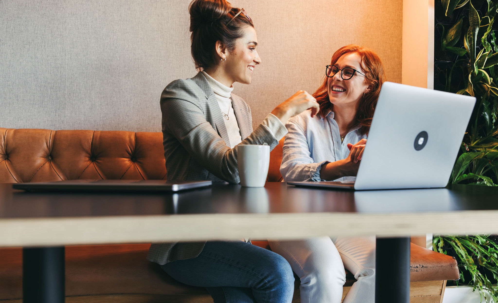 Female colleagues having a discussion at work